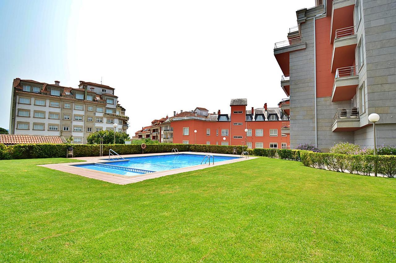 Galihost - Apartamento Con Piscina En El Centro De Sanxenxo Buitenkant foto